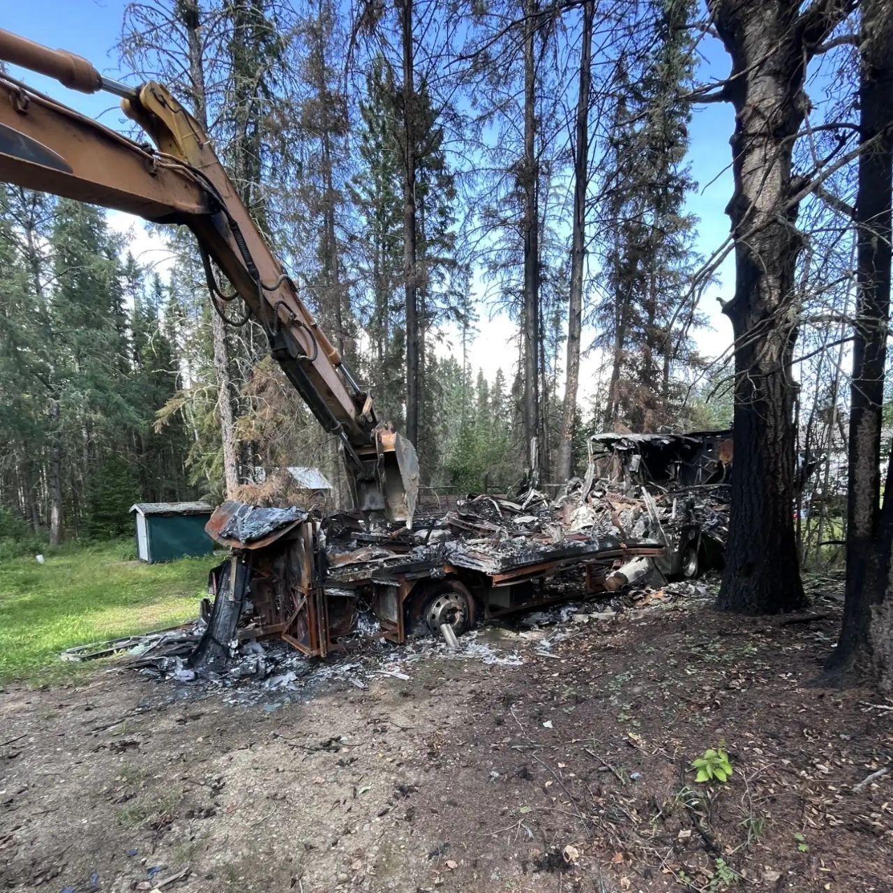 Removing a burnt trailer from a property
